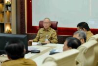 Penjabat (Pj) Sekretaris Daerah Provinsi (Sekdaprov) Sumut M Armand Effendy Pohan usai mengikuti secara virtual Rakor Pengendalian Inflasi 2025, dari Kantor Gubernur Sumut, Jalan Diponegoro Nomor 30, Medan. Senin, (19/05/2025).