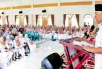 Bupati Simalungun, Dr H Anton Achmad Saragih saat menyampaikan pidato di Pengajian akbar se-Kecamatan Siantar Tahun 2025 yang dilaksanakan oleh Pengajian Akbar Nagori Pematang Simalungun itu berlangsung di Gedung MUI Simalungun, Jln Asahan Kecamatan Siantar, Minggu (29/06/2025).