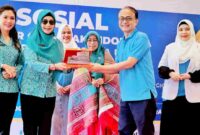 Ketua TP.PKK Kabupaten Simalungun Ny Darmawati Anton Achmad Saragih saat menghadiri kegiatan Community Dental Service IDGAI, berlangsung di Hotel Niaga Parapat Kecamatan Girsang Sipangan Bolon, Simalungun, Sumut, Kamis (3/7/2025).