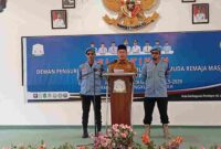 Wakil Bupati saat memberikan sambutan dalam pelantikan pengurus BKPRMI Aceh Timur masa khidmat 2025–2029 di Aula Serbaguna Idi, Selasa (29/7).