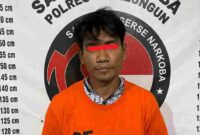 Tersangka inisial TONI saat ditahan sat res Narkoba Polres Simalungun.