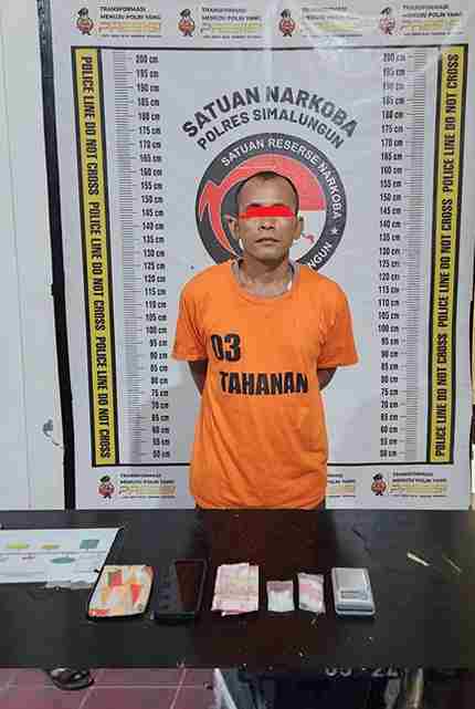 Parlindungan Siringoringo alias Patkai (39), wiraswasta asal Huta I, Nagori Purwodadi, Kecamatan Bandar, ditangkap dengan barang bukti sabu seberat 8,74 gram.