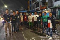 Hari pertama relokasi pedagang korban dan terdampak kebakaran non bencana alam gedung IV yang berjualan di sepanjang Jalan Merdeka, Sabtu malam (27/9/2025)
