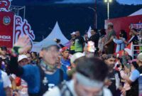 Suasana saat Event  ajang lari lintas alam Trail of The Kings (ToTK) di kawasan Danau Toba, Kabupaten Samosir.  di Tuktuk, Kecamatan Simanindo, Sabtu (18/10/2025). 