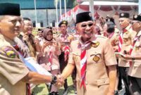 Kwartir Cabang (Kwarcab) Gerakan Pramuka Kabupaten Simalungun menggelar upacara Peringatan Hari Pramuka Ke-64 Tahun 2025 di lapangan Kwarcab Simalungun (CADIKA), Jln Asahan Km. 6,5 Kecamatan Siantar, Kabupaten Simalungun, Sumatera Utara, Kamis, (2/10/2025. 