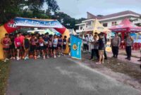 suasana saat Fe Art Fest VI Fun Run Tahun 2025 yang berlangsung di Lapangan Universitas Simalungun (USI), Jalan Sisingamangaraja, Kelurahan Bahkapul, Kecamatan Siantar Sitalasari, Kota Pematangsiantar, pada Minggu (26/10/2025) pukul 06.00 WIB.