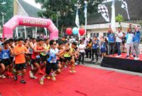 ekretaris Daerah Junaedi Antonius Sitanggang, S.STP., M.Si., turut memeriahkan kegiatan Car Free Day dan Siantar Fun Run 10 Km di Lapangan Adam Malik, Minggu (9/11/2025) pagi