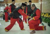 Tapak Suci Putra Muhammadiyah mengukuhkan Bupati Asahan, Taufik Zainal Abidin Siregar, S.Sos., M.Si., sebagai Pendekar Madya Kehormatan. 