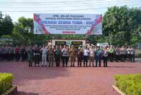 Apel Gelar Pasukan Operasi Kewilayahan Zebra Toba 2025 yang berlangsung di Halaman Kantor Polres Asahan. Apel ini dipimpin oleh Wakapolres Asahan, Kompol Selamet Riyadi, S.H., M.H., serta dihadiri oleh Wakil Bupati Asahan, perwakilan Kejaksaan Negeri, Dandim 0208/Asahan, Danlanal Tanjung Balai–Asahan, dan perwakilan Pengadilan Negeri.