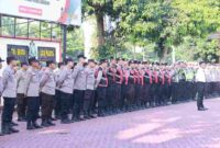 Kapolres Asahan AKBP Revi Nurvelani S.H., S.I.K., M.H. memimpin Apel Pagi Jam Pimpinan di Lapangan Apel Polres Asahan, Senin (1/12/2025) pukul 08.00 WIB.