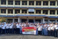 Satuan Binmas Polres Tebing Tinggi saat foto bersama dengan para siswa. 