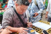 Penerapan pembayaran retribusi pedagang berbasis QRIS sebagai dukungan percepatan digitalisasi daerah.