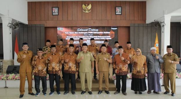 Bupati Asahan saat foto bersama dengan pengurus PWRI.