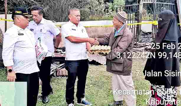 Pemerintah Kabupaten Simalungun menyalurkan bantuan kepada korban kebakaran rumah dinas di Kelurahan Serbalawan, Kecamatan Dolok Batu Nanggar, pada Rabu, 25 Februari 2026