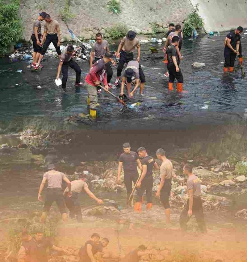 Personel Satuan Brimob Polda Sumut melalui aksi kurve atau pembersihan sungai dan jembatan di Jalan Bhayangkara, Kelurahan Indra Kasih, Kecamatan Medan Tembung, Kota Medan, Selasa (03/02/2026).