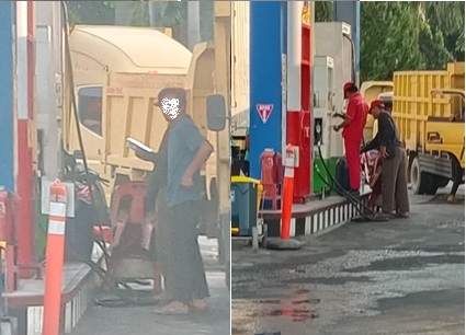 Operator SPBU terlihat melayani Eceran tanpa Barcode di SPBU Jalan Medan. Jumat (27/2) Foto: Atapkota.com -  Trikut/ Valtin.