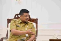 Gubernur Sumatera Utara (Sumut) Bobby Nasution menerima kunjungan kerja Deputi Bidang Pembangunan Wilayah Kementerian PPN/Bappenas, Dirjen Bangda Kemendagri dan Deputi Bidang Koordinasi Penanggulangan Bencana dan Konflik Sosial Kemenko PMK di Ruang Kerja Lantai 10 Kantor Gubernur Sumut Jalan Diponegoro Kota Medan, Senin (9/3/2026).