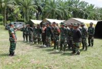 Komandan Kodim (Dandim) 0208/Asahan Letkol Inf. Edy Syahputra, S.H., M.I.P. meninjau langsung kesiapan Marshalling Area (MA) Batalyon Teritorial Pembangunan Yon TP 954/Naga Berkisar di Desa Tomuan Holbung, Kecamatan Bandar Pasir Mandoge, Kabupaten Asahan, Sumatera Utara, Sabtu, 7 Maret 2026.
