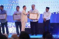 Bupati Asahan hadiri Musrenbang Sumut 2027 dan terima penghargaan dari Mendagri atas kontribusi bantuan kemanusiaan lintas daerah.