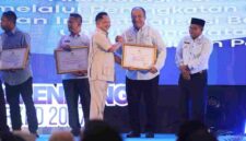 Bupati Asahan hadiri Musrenbang Sumut 2027 dan terima penghargaan dari Mendagri atas kontribusi bantuan kemanusiaan lintas daerah.