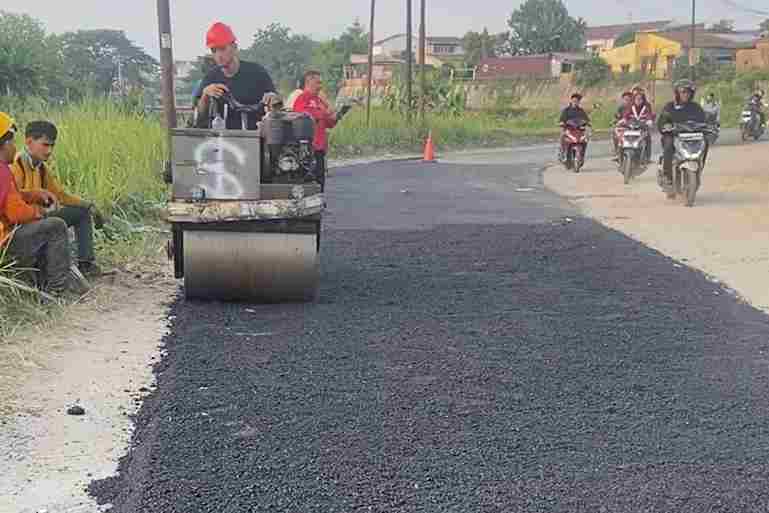 perbaikan Jalan Speksi Kanal yang kini telah selesai diaspal oleh Pemerintah Kota Medan.