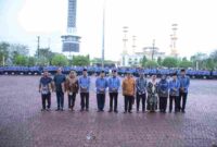 Rangkaian upacara Hari Kesadaran Nasional (HKN) di halaman Kantor Bupati Asahan, Jumat (17 April 2026) pagi.