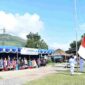 Upacara peringatan Hari Pendidikan Nasional (Hardiknas) 2026 yang berlangsung pada Jumat (2/5/2026) di Tanah Lapang Pangururan, Kabupaten Samosir.
