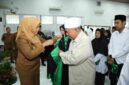 Wakil Wali Kota Pematangsiantar, Herlina, saat memakai toga sebagai simbol dewan Hakim MTQ. 