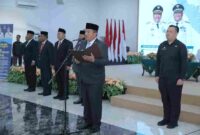 Bupati Asahan, Taufik Zainal Abidin, memimpin pengambilan sumpah dan pelantikan Jabatan Pimpinan Tinggi Pratama di lingkungan Pemerintah Kabupaten (Pemkab) Asahan yang berlangsung di Aula Melati Kabupaten Asahan, Jumat (8/5/2026).