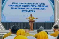 Wali Kota Medan, Rico Tri Putra Bayu Waas, saat membuka Sosialisasi dan Bimbingan Teknis Penggunaan Aplikasi Portal Perlindungan Sosial (Perlinsos) di Ruang Kuala Deli, Bank Indonesia, Senin, 25 Mei 2026.