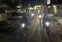 Personel Kompi 3 Batalyon C Pelopor Satuan Brimob Polda Sumatera Utara menggelar patroli dini hari.