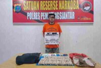 l GM (23), warga Jalan Durian, Gang Pulut Putih, Kelurahan Marihat Jaya, Kecamatan Siantar Marihat, Kota Pematangsiantar.