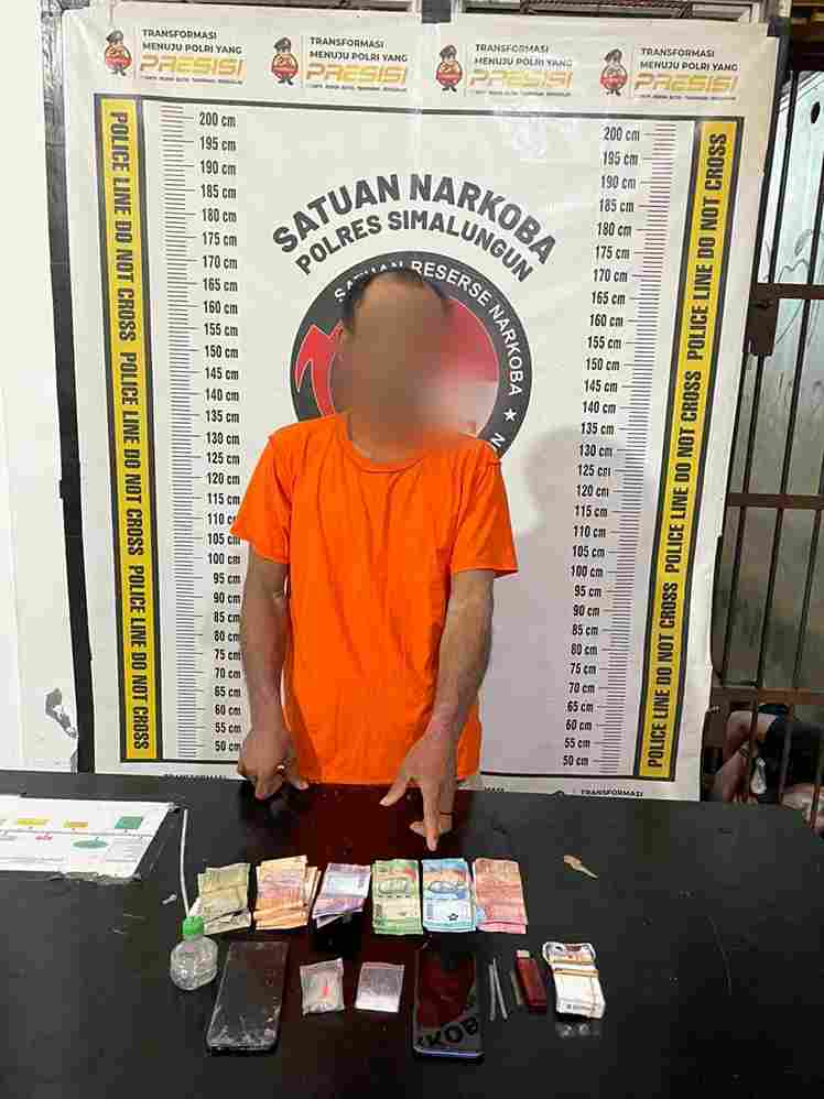 Pelaku saat diamankan Polisi.