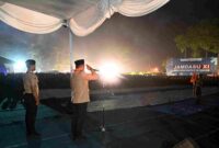 Gubernur Sumatera Utara (Sumut) Bobby Afif Nasution di dampingi Penjabat Sekretaris Daerah Provinsi (Sekdaprov) Sumatera Utara (Sumut) Sulaiman Harahap beserta Seluru OPD dan Forkopimda beserta Kepala Daerah melakukan prosesi renungan suci dan api unggun pada acara Jambore Daerah XI di lapangan bumi perkemahan Sibolangit, Kabupaten Deliserdang, Sabtu malam (11/7/2026)
