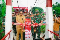 Pangdam I/BB dan Wali Kota Medan meresmikan Jembatan Perintis Garuda yang menghubungkan kembali Medan Polonia, Johor, dan Maimun.