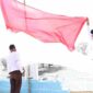 Kirab dan Pengibaran Bendera Merah Putih di Desa Silo Baru.