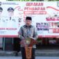 Bupati Asahan Taufik Zainal Abidin memimpin pembagian 7.230 Bendera Merah Putih.