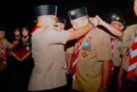 Bupati Asahan Taufik Zainal Abidin menerima Lencana Melati Gerakan Pramuka di Cibubur sebagai apresiasi atas dukungan pembinaan generasi muda.