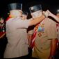 Bupati Asahan Taufik Zainal Abidin menerima Lencana Melati Gerakan Pramuka di Cibubur sebagai apresiasi atas dukungan pembinaan generasi muda.