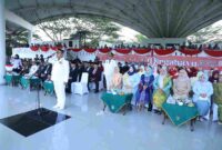 Wakil Bupati Asahan memimpin upacara penurunan bendera HUT ke-81 RI di Kisaran,.