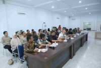 Rapat Koordinasi Persiapan Program Digitalisasi Bantuan Sosial (Parlinsos Digital) Kabupaten Asahan Tahun 2026 di Aula Melati Kantor Bupati Asahan, Kamis (20/8/2026).