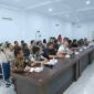 Rapat Koordinasi Persiapan Program Digitalisasi Bantuan Sosial (Parlinsos Digital) Kabupaten Asahan Tahun 2026 di Aula Melati Kantor Bupati Asahan, Kamis (20/8/2026).