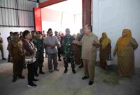 Bupati Asahan Taufik Zainal Abidin meninjau KDMP, Jembatan Perintis Garuda 87 meter, dan irigasi 430 hektare untuk memperkuat ekonomi warga.