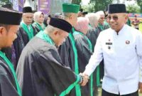 Bupati Simalungun saat menghadiri Musabaqah Tilawatil Qur'an (MTQ) Ke-52 Tingkat Kabupaten Simalungun Tahun 2026 di Lapangan Sepak Bola PTPN IV Regional I Kebun Bangun, Nagori Pematang Sahkuda, Kecamatan Gunung Malela, Senin (18/5/2026).
