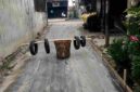 Kondisi jalan yang telah direhab dengan rabat beton.