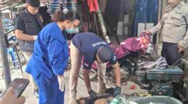 Pria 23 tahun ditemukan meninggal di belakang rumah warga di Marihat Bandar, Simalungun. INAFIS melakukan olah TKP dan visum luar.