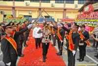 AKBP Sah Udur Sitinjak dalam Prosesi Pisah Jabatan di Polres Pematangsiantar.
