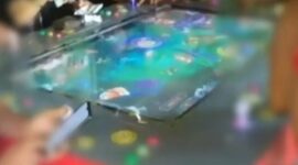 Mesin permainan tembak ikan.