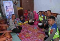Polres Pematangsiantar menyambangi Hany, anak dengan hidrosefalus, dalam bakti sosial Hari Lalu Lintas Bhayangkara ke-71 pada Sabtu, 19 September 2026.