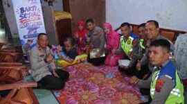 Polres Pematangsiantar menyambangi Hany, anak dengan hidrosefalus, dalam bakti sosial Hari Lalu Lintas Bhayangkara ke-71 pada Sabtu, 19 September 2026.